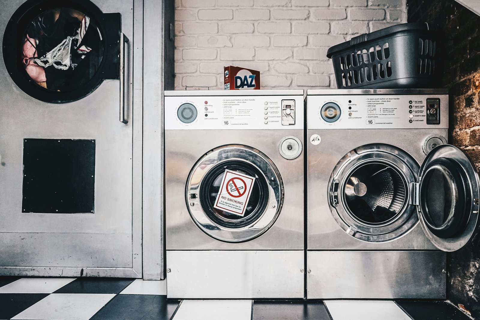 Samsung service center technician repairing a Samsung washing machine in Dubai — certified repair UAE